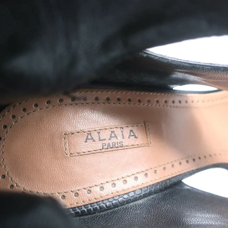 Bottes Plateforme Alaia à Découpes en Cuir Noir Imprimé Lézard Taille 38.5