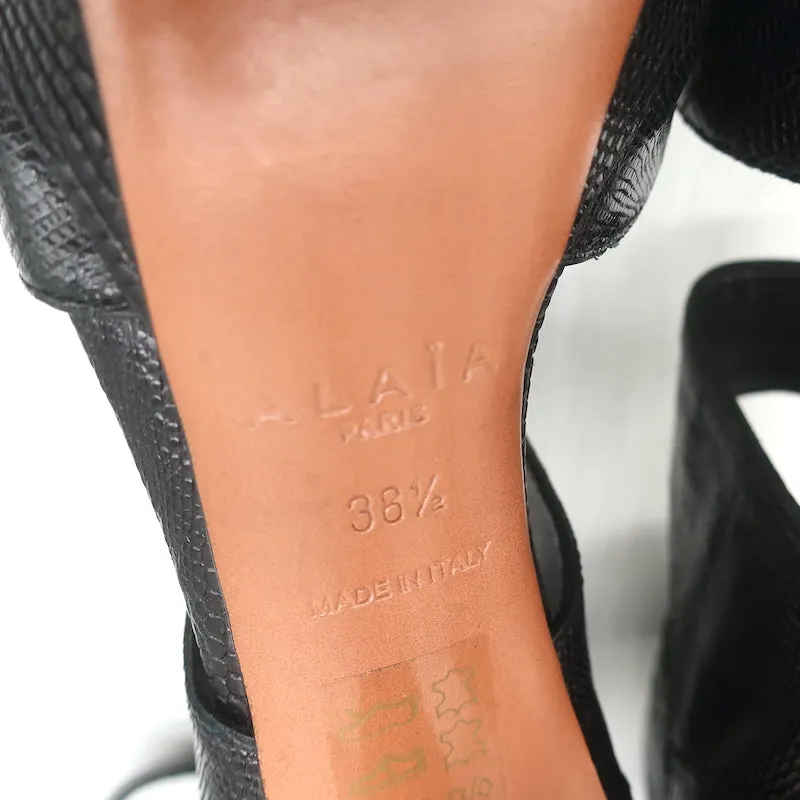 Bottes Plateforme Alaia à Découpes en Cuir Noir Imprimé Lézard Taille 38.5