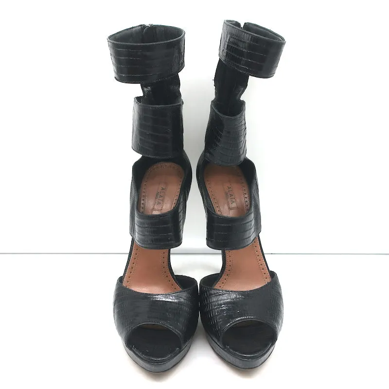 Bottes Plateforme Alaia à Découpes en Cuir Noir Imprimé Lézard Taille 38.5