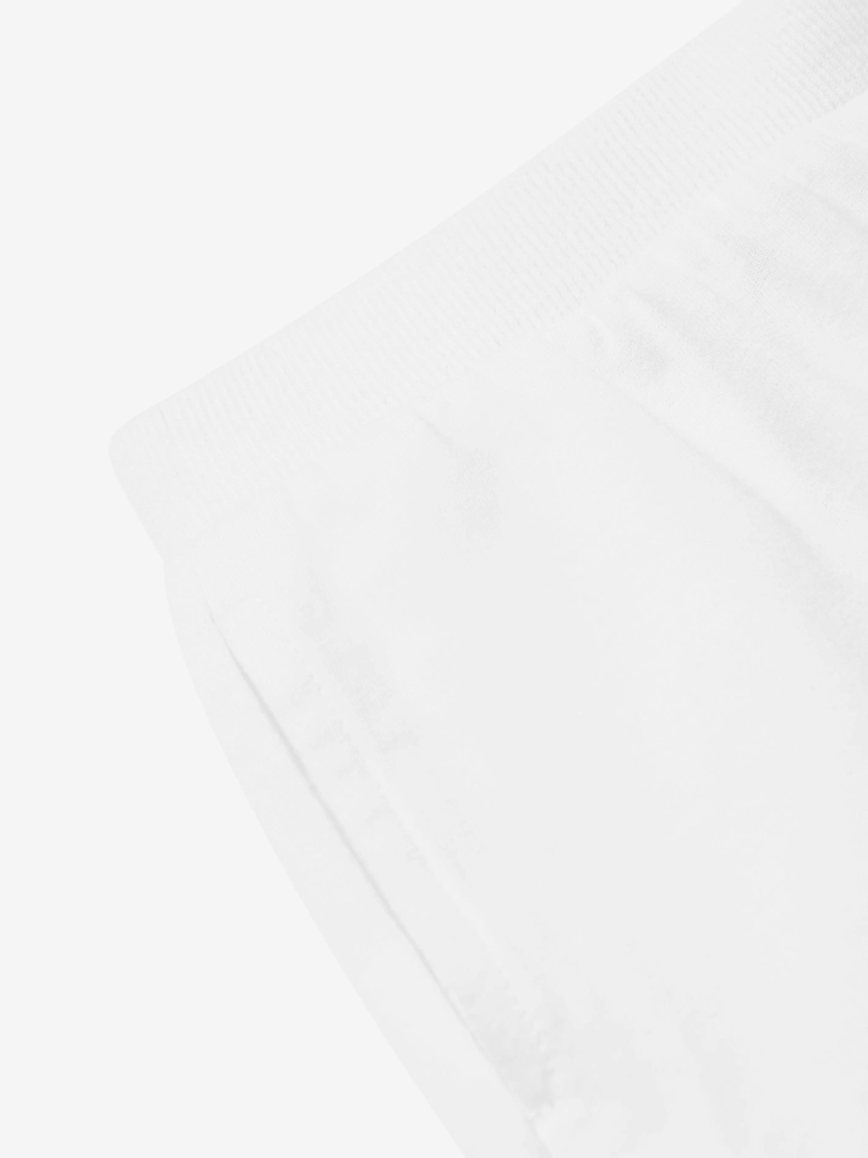 Short en blanc avec logo ourson bébé