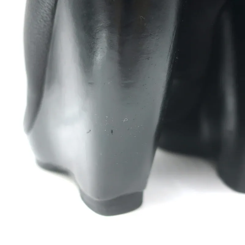 Balenciaga Bottes à cheville à plateforme pliante en coin en cuir grainé noir Taille 41