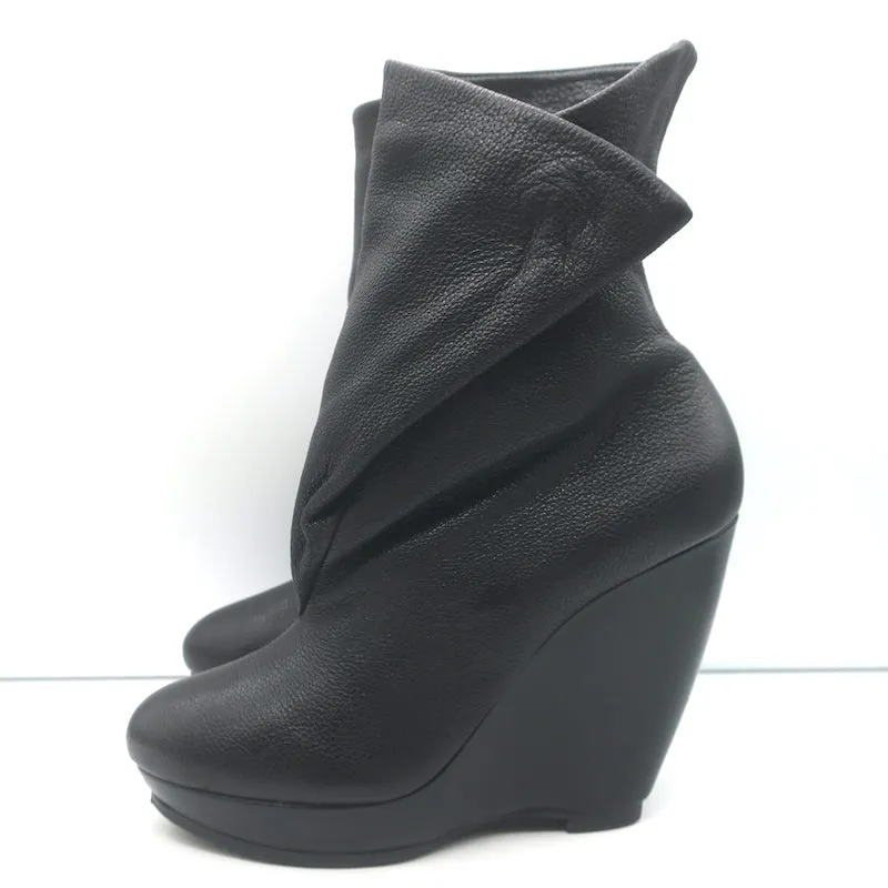 Balenciaga Bottes à cheville à plateforme pliante en coin en cuir grainé noir Taille 41