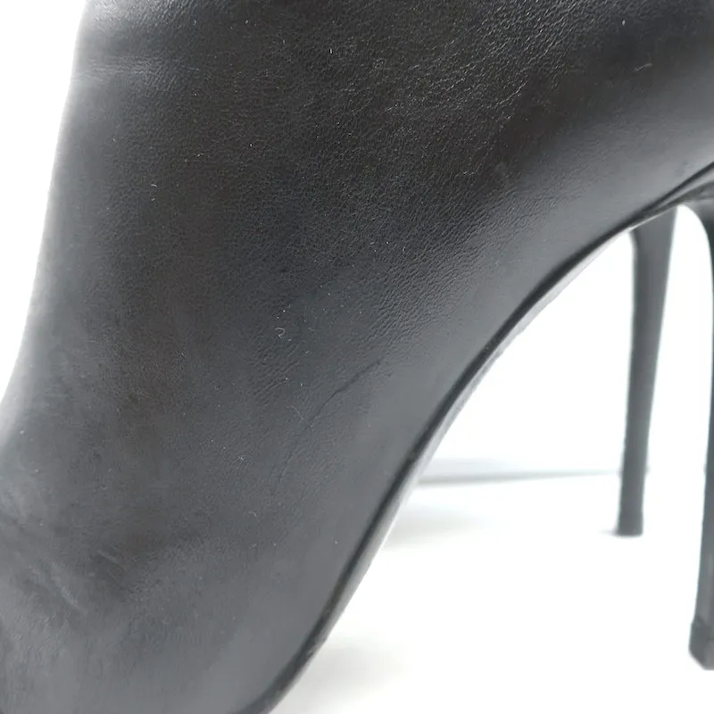 Balenciaga Bottines à lacets avec clous géants en cuir noir taille 40