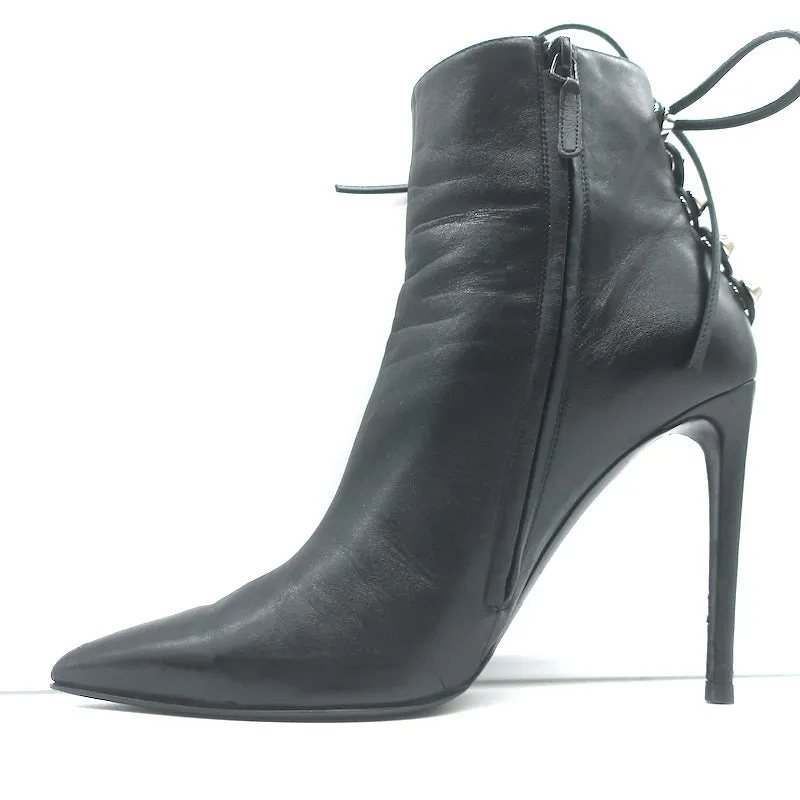 Balenciaga Bottines à lacets avec clous géants en cuir noir taille 40