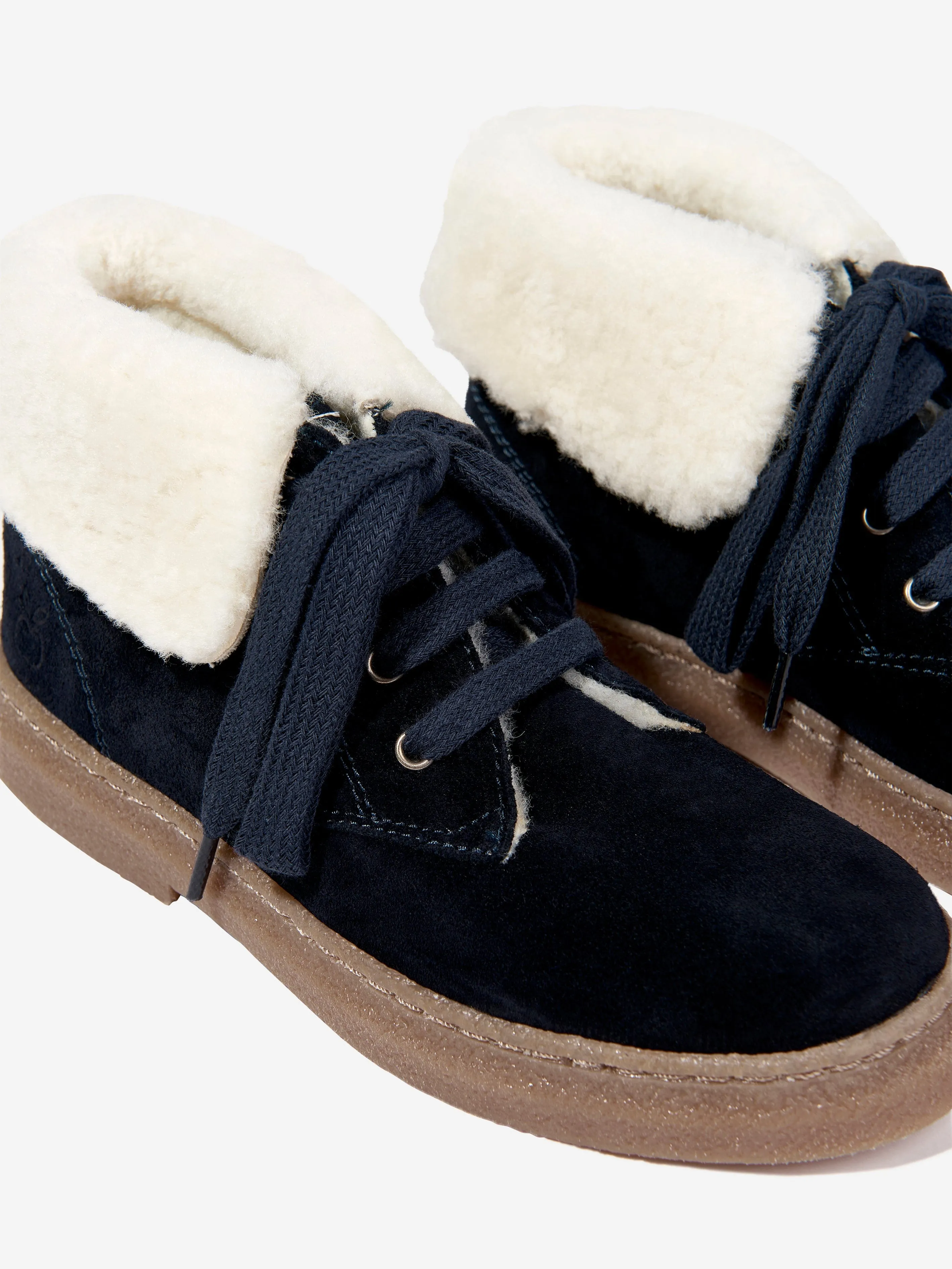Bottes en fourrure Trix en peau de mouton Pom D'Api Kids en marine