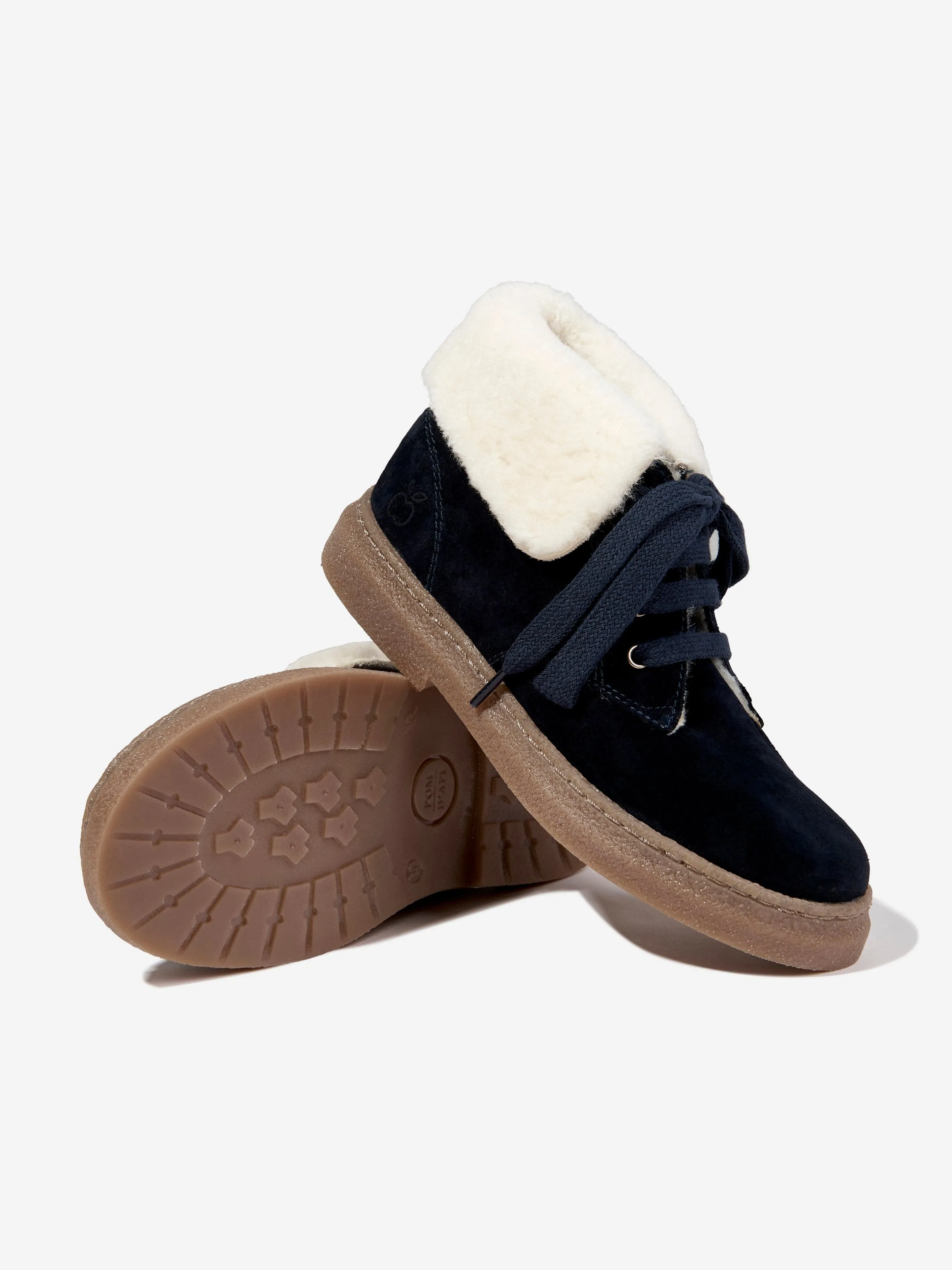 Bottes en fourrure Trix en peau de mouton Pom D'Api Kids en marine