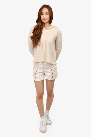 Pre-Loved Chanel™ 2018 Beige/White Denim Button Detailed Shorts Size 34
