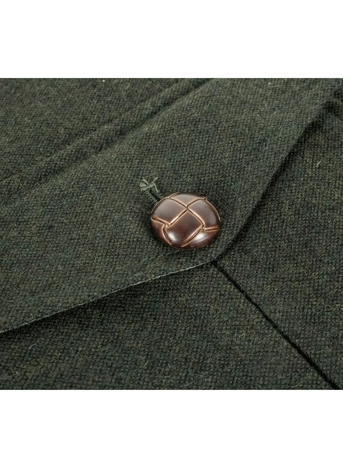 Veste en tweed avec coudière de chasse